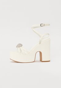 Atlasīts, white
