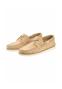 Beige leren boot schoenen met een ronde neus, lichte stiksels en vetersluiting. Voorzien van een witte rubberen zool en een gevoerde inlegzool.
