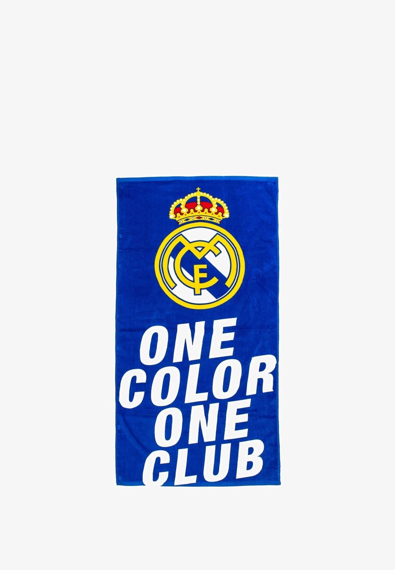 Asciugamano blu con il logo del Real Madrid al centro, e il testo "UN COLORE UN CLUB" in lettere bianche grasse in fondo.