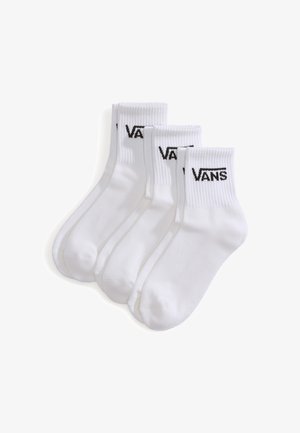 Białe skarpetki bawełniane w zestawie czterech sztuk z prążkowanymi mankietami i czarnym logo "VANS" z przodu. Miękka tekstura z klasycznym, średnim krojem.