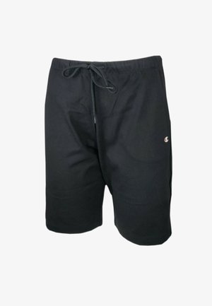 Pantalones cortos negros, ligeros, con una cinturilla elástica y cordón ajustable. Presenta un pequeño logo en la parte inferior de la pierna izquierda. Textura suave, ajuste casual.