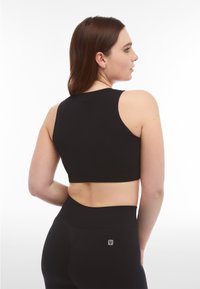 Freddy SEAMLESS SPORT - Sujetadores deportivos con sujeción media - nero