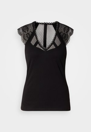 Fekete ujjatlan felső csipkés díszítéssel a vállaknál és áttetsző, pöttyös hálós betéttel a nyakban és a háton.