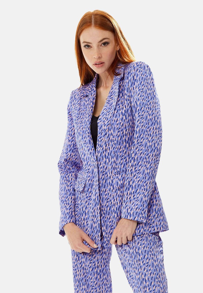 Purple blazer with a textured pattern of pink and navy shapes, featuring a notched lapel and two front pockets.