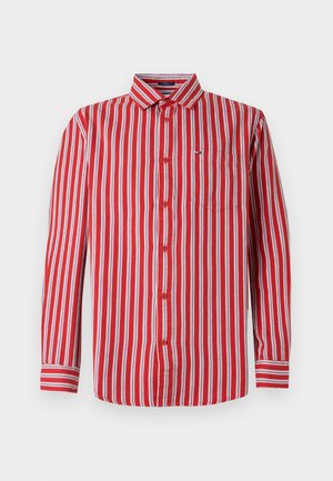 Red and white striped button-up shirt with long sleeves, collar, pocket on the chest, and contrasting cuffs. Made of fabric with a smooth texture.