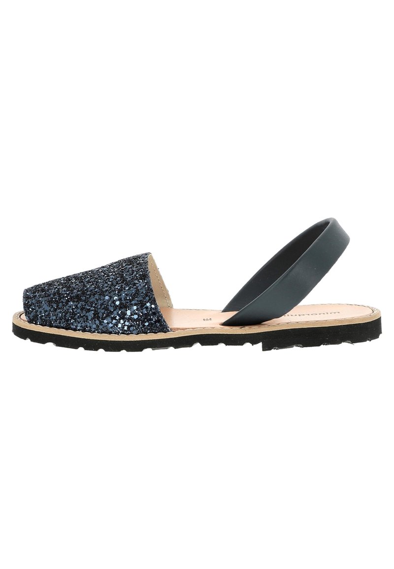 Black glitter slingback sandals with a rounded toe, textured shimmering upper, and a flexible rubber sole.