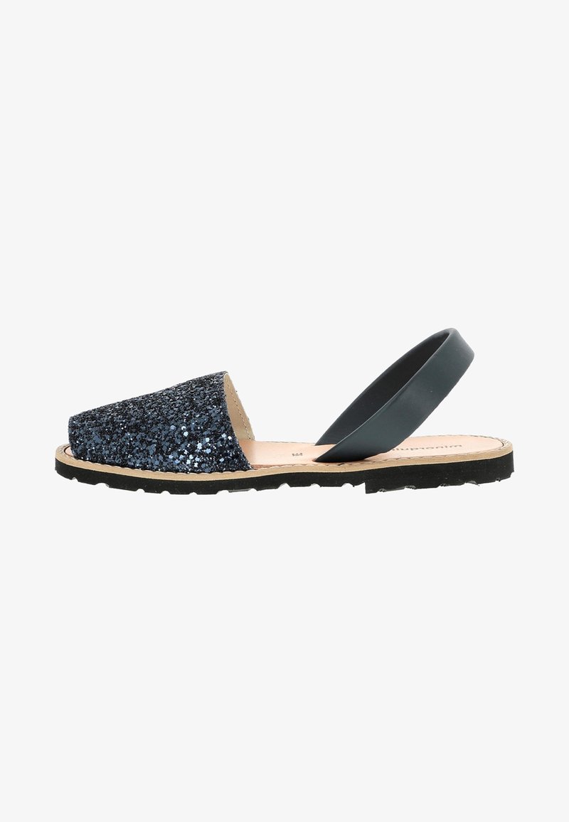Black glitter slingback sandals with a rounded toe, textured shimmering upper, and a flexible rubber sole.