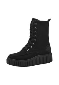 Bottines à lacets noires en daim souple, avec un bout rond, une semelle épaisse à nervures et un détail de logo sur le côté.