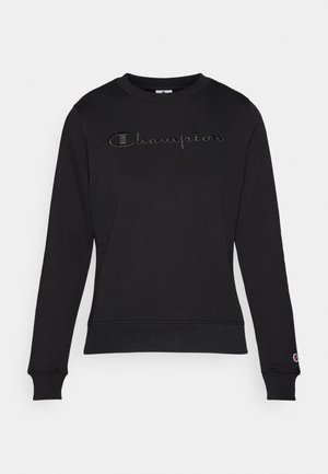 Black sweatshirt with long sleeves, round neckline, and embroidered "Champion" logo in dark thread across the chest. Ribbed cuffs and hem.