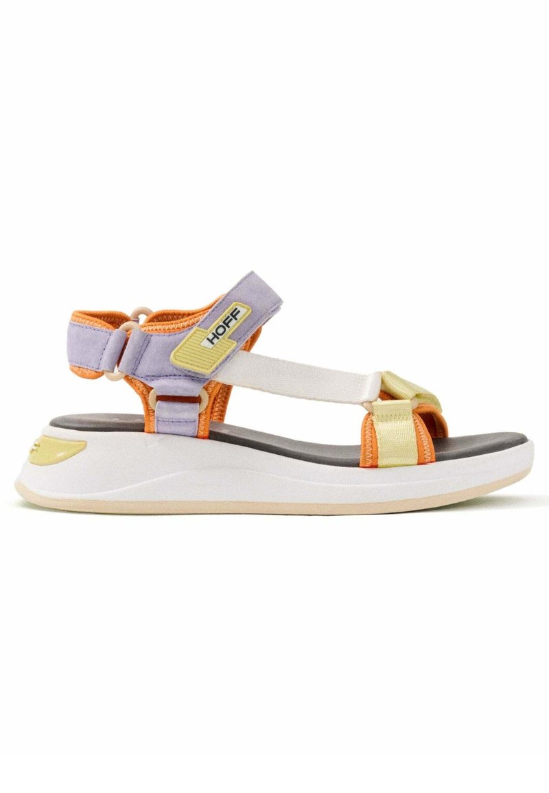 Sandalia multicolor con suela blanca, tiras moradas y naranjas, plantilla acolchada y cierres ajustables para un ajuste seguro.