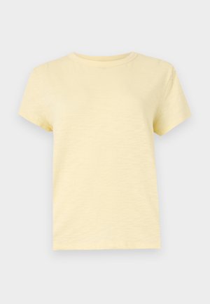 T-shirt jaune clair à manches courtes et col rond, au design uni, affiché sur un fond plat gris clair.