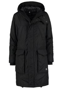 Longue parka d'hiver noire avec capuche, fermeture éclair à l'avant et boutons-pression, quatre poches avant et poignets intérieurs côtelés.