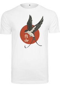 Hvit bomull t-skjorte med et svart og grått fuglemotiv mot en rød sirkel, med japanske tegn under fuglen.
