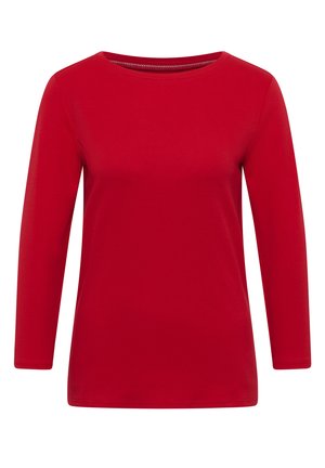 T-shirt rouge à manches longues et col rond, fabriqué en tissu doux avec une texture lisse et un design simple et sans embellissement.