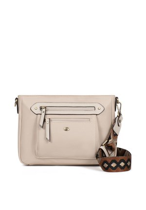 Sac bandoulière en cuir beige avec deux poches zippées à l’avant et une bandoulière amovible en tissu marron à motif géométrique.