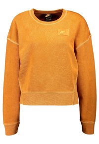 Orange fleece-tröja med rund hals, långa ärmar och ribbade muddar. Har en liten Nike-logotyp på framsidan.