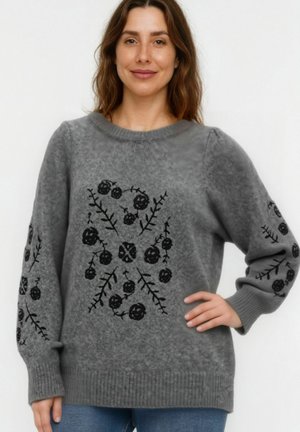 - Sweter