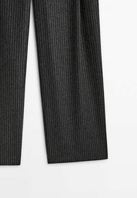 Dark gray pinstripe fabric with thin vertical white lines, showing the lower half of straight-leg dress trousers on a white background.