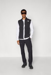 The North Face MOUNTAIN ATHLETICS HYBRID VEST - Mellény - black