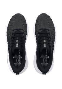 Black athletic shoes featuring a textured mesh upper and white sole. The design includes laces and branding on the insole.