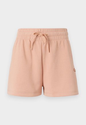 Pantalones cortos de color melocotón con cintura elástica y cordón. Hechos de una tela suave, con un pequeño logo en la parte inferior izquierda.