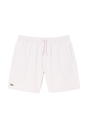 Light pink swim shorts made of lightweight material, featuring an elastic waistband with a drawstring and side pockets. Includes logo detail.