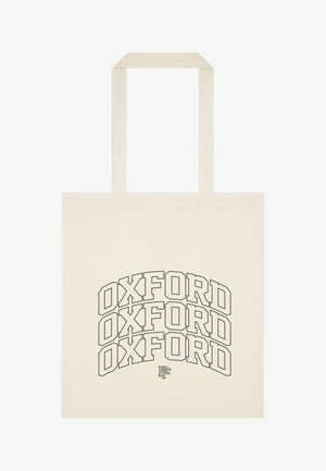 Béžová taška typu tote s třemi naskládanými slovy „OXFORD“ tučným ohraničeným písmem a malým stylizovaným logem „PF“ dole.