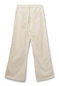 Beige wide-leg pants with two back patch pockets, belt loops, and subtle lightning bolt embroidery on the right pocket.