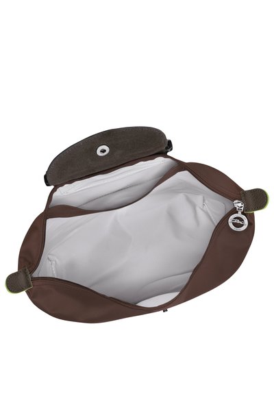 Brown pouch made of smooth material, featuring a gray suede flap, snap closure, and a white interior with no pockets.