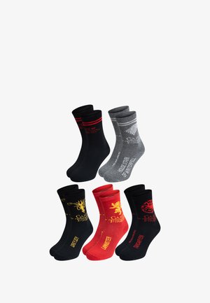 Set di sei calzini a tema Game of Thrones. Colori: nero, grigio e rosso. Ognuno presenta distinti loghi e nomi delle case in testo a contrasto.