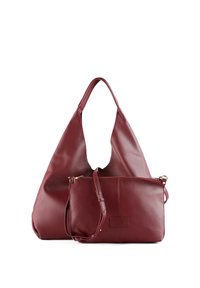 Ensemble de sacs en cuir rouge comprenant un grand tote souple et une plus petite pochette zippée, tous deux dotés d'une texture lisse avec des accents subtils.