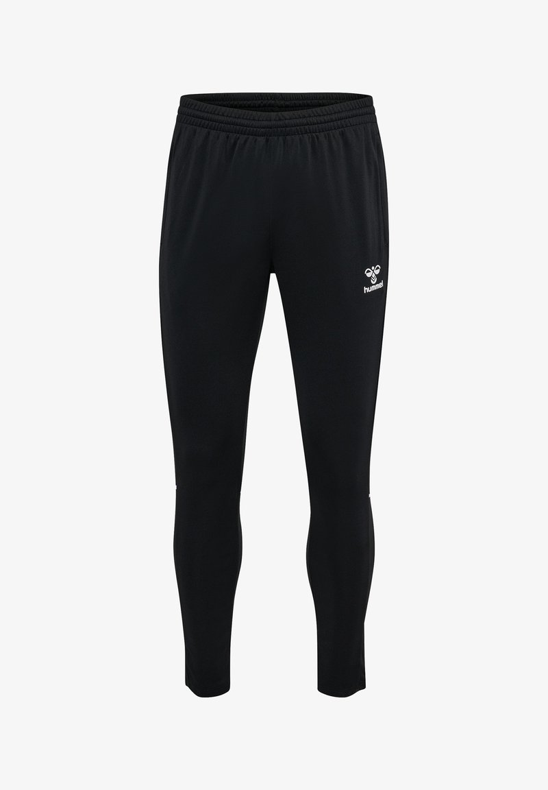 Black athletic track pants with elastic waistband and white hummel logo on upper thigh, slim fit tapering at ankles.