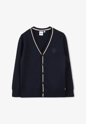 Cardigan blu navy realizzato in tessuto texturizzato, caratterizzato da un colletto a V, rifiniture in crema a contrasto, bottoni neri e un logo ricamato sul petto.