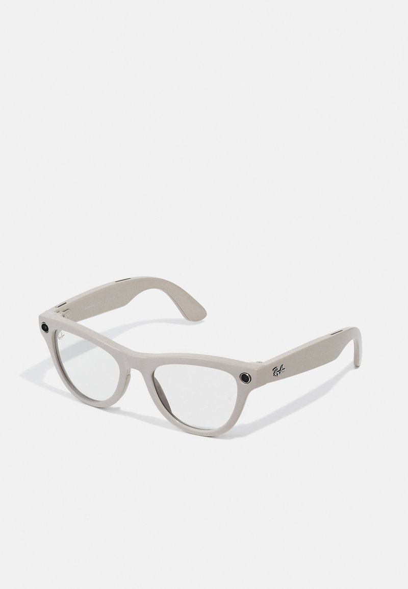 Cat-eye glasses with a matte light gray plastic frame, clear lenses, and black accents on the frame. Brand logo visible on the side.