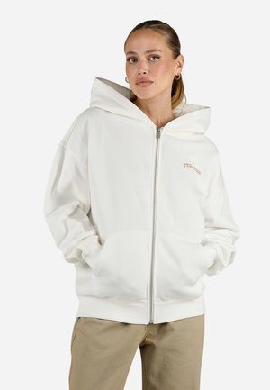Weißer Kapuzenpullover mit großem Kapuzenbereich, Fronttaschen und gesticktem Logo. Hat eine lockere Passform und eine weiche Stoffstruktur.
