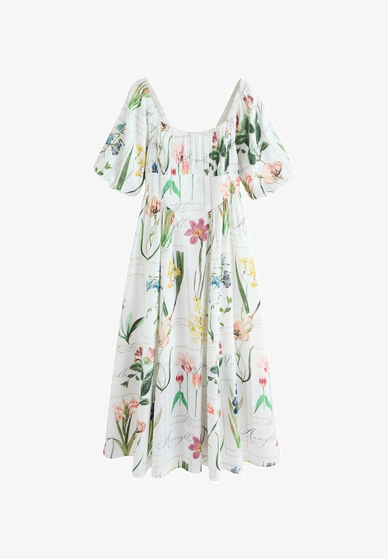 Robe midi blanche à manches bouffantes avec des imprimés floraux et botaniques multicolores, corsage froncé avec un décolleté carré.