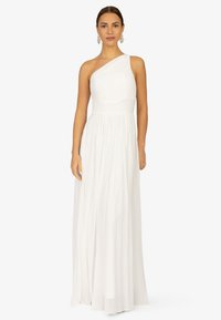 Weißes, einseitig tragbares Kleid mit plissiertem Oberteil und fließendem Rock. Verfügt über einen schmalen Taillenbund und eine subtile Textur im gesamten Stoff.