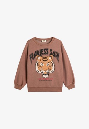 Brun sweatshirt med tigerhoved grafik og teksten "Fearless Soul" samt "Lev livet på din måde, accepter forandring og gå videre."