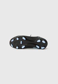 Black athletic shoe sole featuring blue accents, a textured surface, circular traction pods, and a logo near the heel.