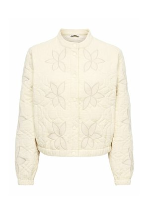 Kremna prešita jakna z vzorci cvetličnega šivanja, z zapiranjem na pritrdilne gumbe, stoječim ovratnikom, elastičnimi manšetami in pasom.