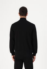 KARL LAGERFELD Felpa con zip - black