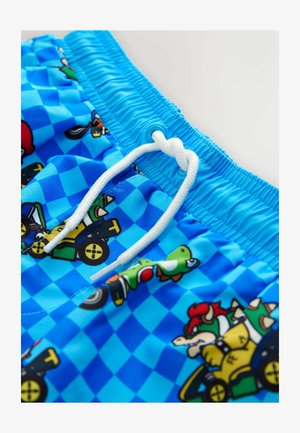 Plave kupaće hlačice s uzorkom na kockice i crtanim likovima, s bijelim vezicama i elastičnim pojasom.