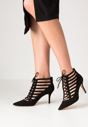 Ankle boots - black