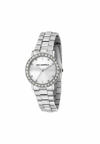 Silberner Metallarmbanduhr mit rundem Ziffernblatt, weißem Zifferblatt und Kristallakzenten auf der Lünette. Verfügt über ein Armbanddesign mit polierter Oberfläche.