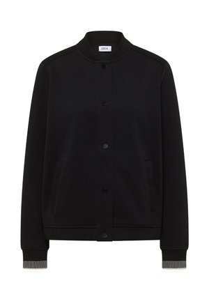 Veste bomber noire avec boutons-pression, col et poignets côtelés ornés de bandes blanches, et poches latérales.