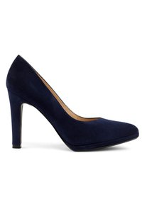 Zapato de tacón alto de gamuza azul marino con punta afilada, textura suave y una altura de tacón de 10 cm. La suela y el forro interior son de color beige.