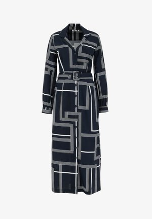Robe longue bleu marine avec des motifs géométriques blancs, devant à boutons, col et taille ceinturée. Fabriquée en tissu léger avec des manches longues.