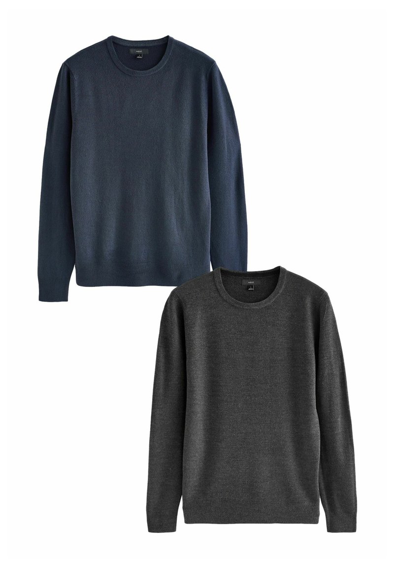 Deux pulls ras du cou en marine foncé et gris charbon, dotés d'une construction sans couture et d'une texture lisse, présentés horizontalement.