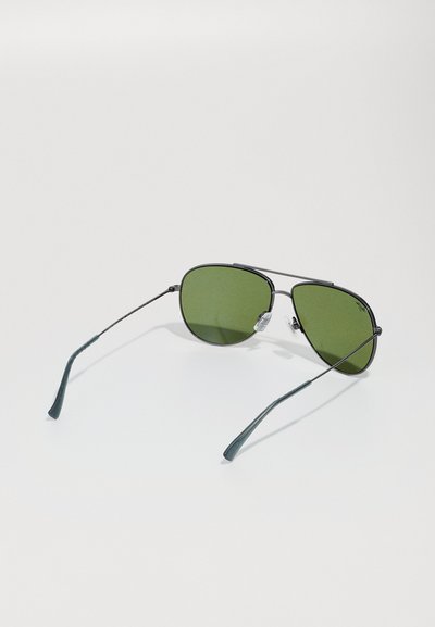 Metal aviator sunglasses with green lenses, thin black frames, and textured green temple arms, featuring nose pads for comfort.