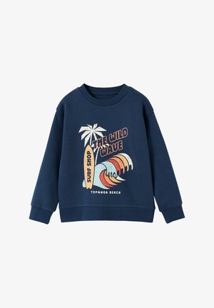 Navy blue sweatshirt with palm tree, surfboard, colorful wave graphic, and text "The Wild Wave," "Surf Shop," and "Topanga Beach" on front.